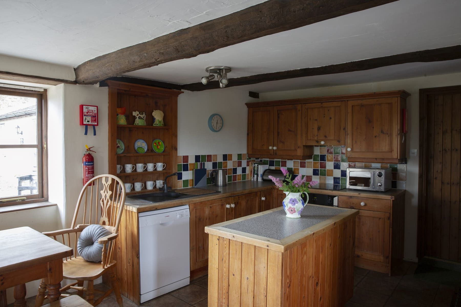 Jasmine Cottage kitchen with wooden units and island