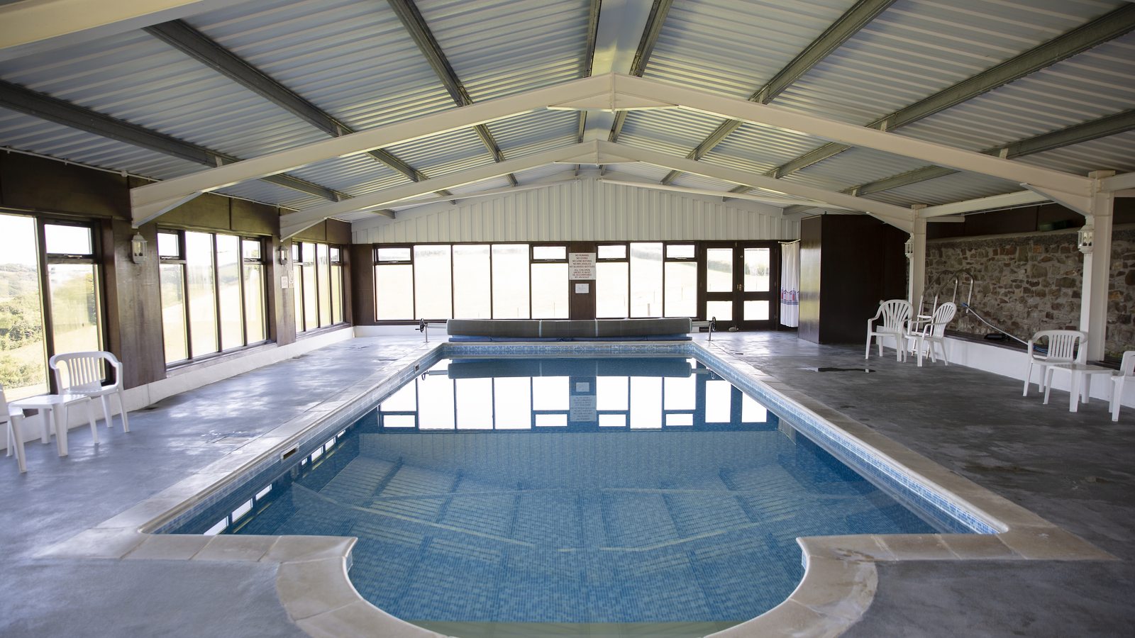 Heated indoor swimming pool at Woodlands Manor Farm