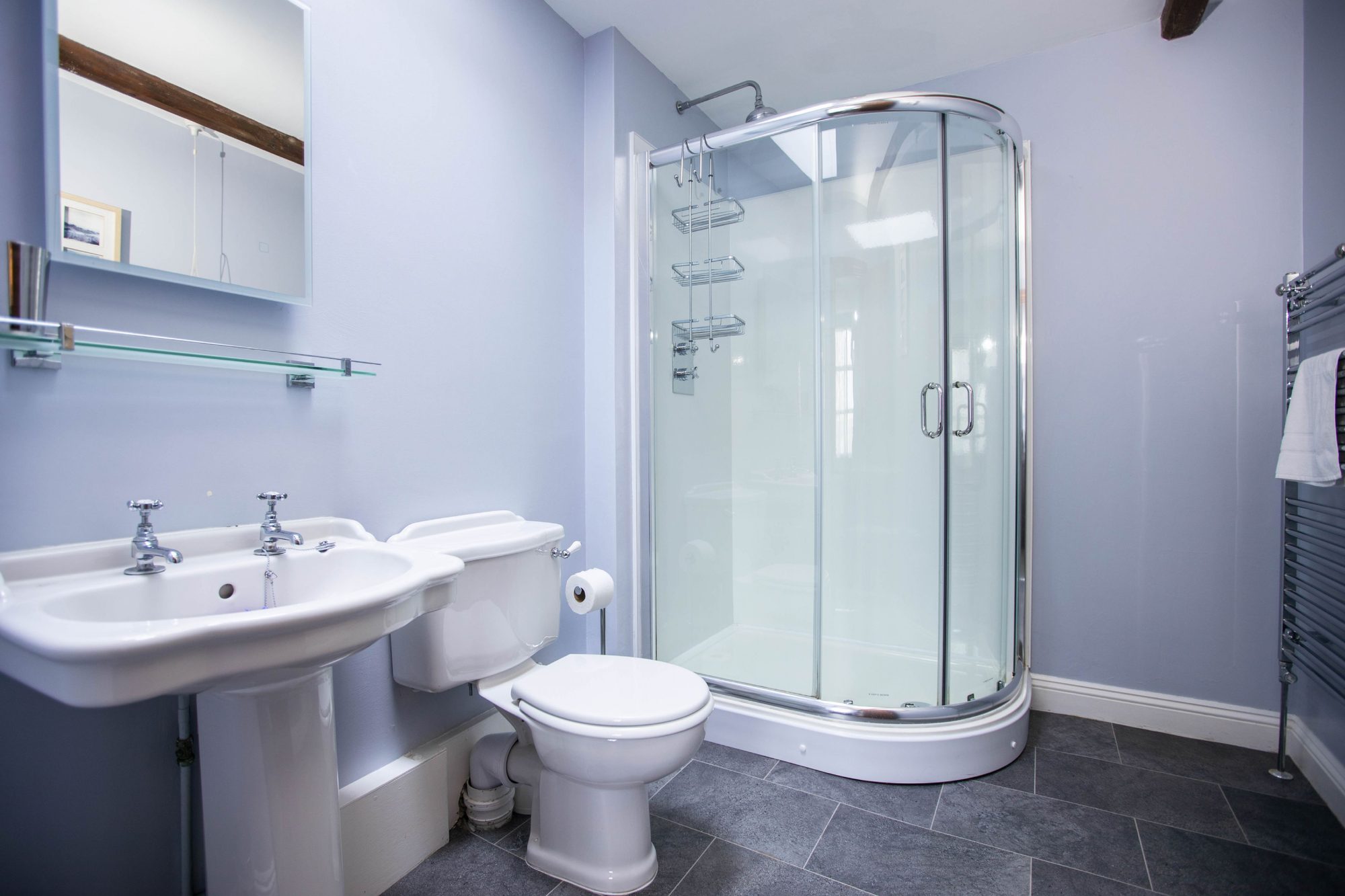 Lavender Cottage bathroom with corner shower
